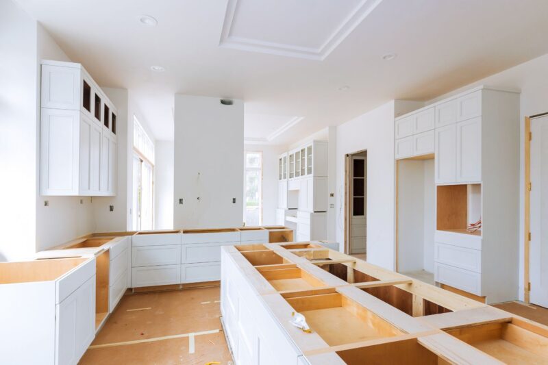 Modern kitchen under construction in a custom-built Ringwood home featuring white cabinetry and an open-plan layout – Ringwood custom home builder project